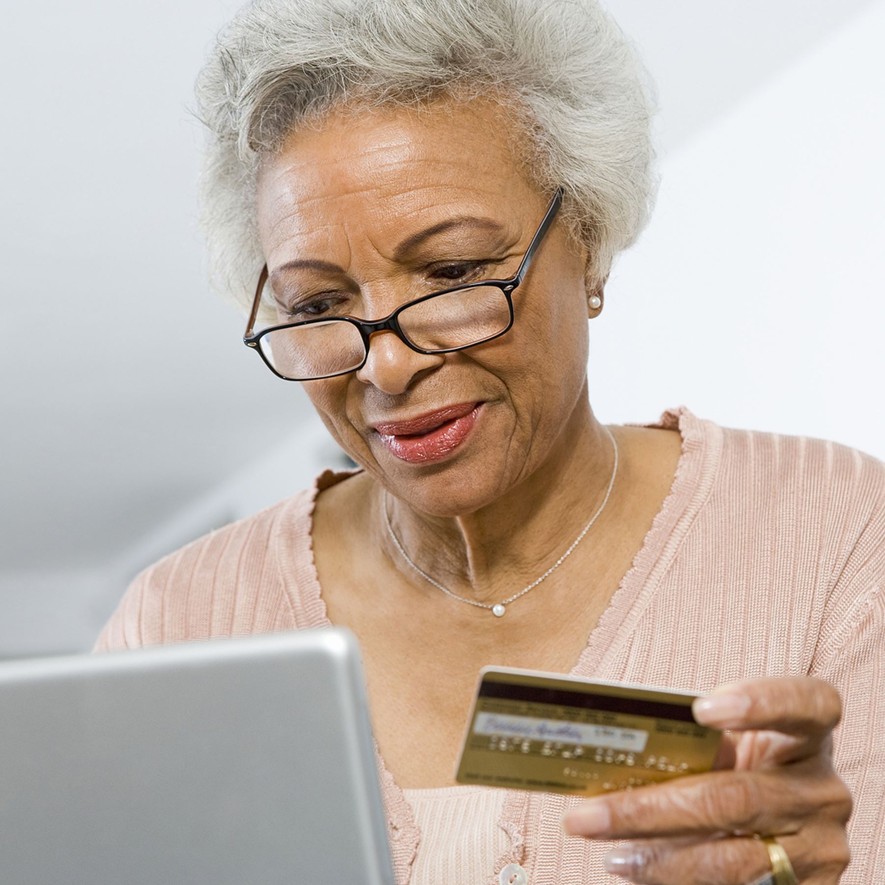 Medicare Fraud Woman with Credit Card